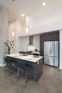 With vaulted ceilings, an island kitchen, and thoughtful design touches, our Live Work Units provide a truly urban vibe!